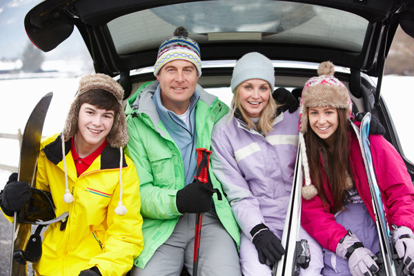 Happy family on ski trip