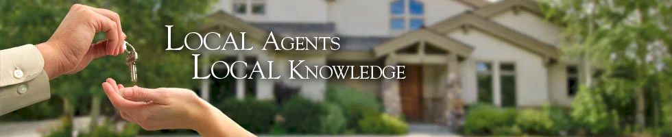 Local Park City Real estate agent with house